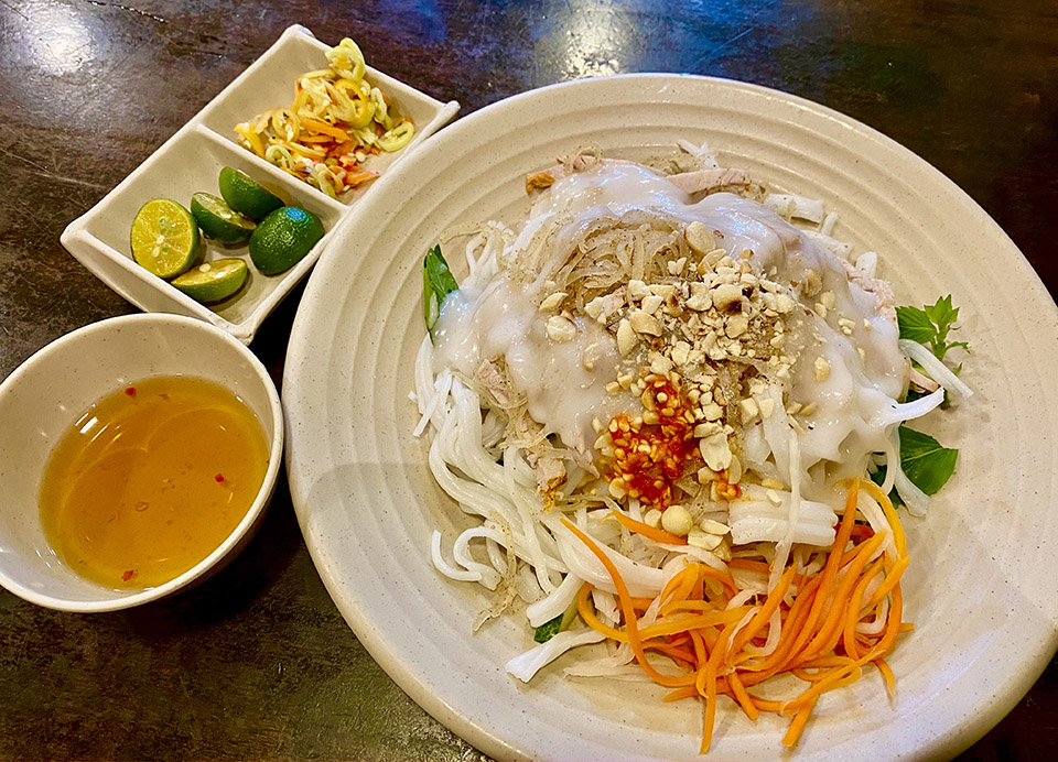 Banh Tam Bi (Steamed Rice Noodles with Pork) (source: Saigon times)